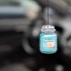 imageYankee Candle Car Air Fresheners Hanging Car Jar Ultimate 3Pack Neutralizes Odors Up To 30 Days Includes 1 Leather 1 Midsummers Night and 1 New ScentBahama Breeze  Black Coconut  Turquoise Sky