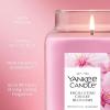 imageYankee Candle Lilac Blossoms Scented Classic 22oz Large Jar Single Wick Candle Over 110 Hours of Burn Time Perfect for Gifting Gatherings and Seasonal DecorationsEnchanting Cherry Blossom