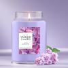 imageYankee Candle Lilac Blossoms Scented Classic 22oz Large Jar Single Wick Candle Over 110 Hours of Burn Time Perfect for Gifting Gatherings and Seasonal DecorationsLilac Blossoms