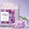 imageYankee Candle Lilac Blossoms Scented Classic 22oz Large Jar Single Wick Candle Over 110 Hours of Burn Time Perfect for Gifting Gatherings and Seasonal DecorationsLilac Blossoms