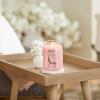imageYankee Candle Lilac Blossoms Scented Classic 22oz Large Jar Single Wick Candle Over 110 Hours of Burn Time Perfect for Gifting Gatherings and Seasonal DecorationsFresh Cut Roses