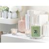 imageYankee Candle Meadow Showers Scented Classic 22oz Large Jar Single Wick Candle Over 110 Hours of Burn Time Green