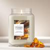 imageYankee Candle Vanilla Cupcake Scented Classic 22oz Large Jar Single Wick Candle Over 110 Hours of Burn Time Ideal for Creating Relaxing Ambience ampamp Holiday GiftingAmber  Sandalwood