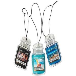 imageYankee Candle Car Air Fresheners Hanging Car Jar Ultimate 3Pack Neutralizes Odors Up To 30 Days Includes 1 Leather 1 Midsummers Night and 1 New ScentBahama Breeze  Black Coconut  Turquoise Sky