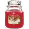 imageYankee Candle Buttercream Scented Classic 22oz Large Jar Single Wick Candle Over 110 Hours of Burn TimeSparkling Cinnamon
