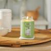 imageYankee Candle Buttercream Scented Classic 22oz Large Jar Single Wick Candle Over 110 Hours of Burn TimeVanilla Lime