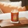 imageYankee Candle Kitchen Spice Scented Classic 22oz Large Jar Single Wick Over 110 Hours of Burn Time Ideal for Home Celebrations GiftingAutumn Leaves