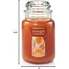 imageYankee Candle Pink Sands Scented Classic 22oz Large Jar Single Wick Candle Over 110 Hours of Burn Time Perfect for Creating Relaxing AtmosphereHoney Clementine