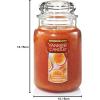 imageYankee Candle Pink Sands Scented Classic 22oz Large Jar Single Wick Candle Over 110 Hours of Burn Time Perfect for Creating Relaxing AtmosphereHoney Clementine