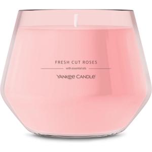 imageYankee Candle Studio Scented Candle with up to 50 Hour Burn Time Premium Plant Wax Blend for Consistent Burn 10 oz Jar Candle with Room Filling Fragrance Iced Berry LemonadeFresh Cut Roses