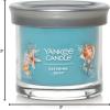imageYankee Candle Large Tumbler Scented Candle with up to 80 Hour Burn Time Premium Plant Wax Blend for Consistent Burn 20 oz Tumbler Candle with Room Filling Fragrance Beach WalkCatching Rays