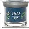 imageYankee Candle Large Tumbler Scented Candle with up to 80 Hour Burn Time Premium Plant Wax Blend for Consistent Burn 20 oz Tumbler Candle with Room Filling Fragrance Midsummers NightBayside Cedar