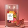 imageYankee Candle Large Tumbler Scented Candle with up to 80 Hour Burn Time Premium Plant Wax Blend for Consistent Burn 20 oz Tumbler Candle with Room Filling Fragrance Dried Lavender ampamp OakAutumn Leaves