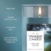 imageYankee Candle Large Tumbler Scented Candle with up to 80 Hour Burn Time Premium Plant Wax Blend for Consistent Burn 20 oz Tumbler Candle with Room Filling Fragrance Midsummers NightBayside Cedar