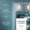 imageYankee Candle Large Tumbler Scented Candle with up to 80 Hour Burn Time Premium Plant Wax Blend for Consistent Burn 20 oz Tumbler Candle with Room Filling Fragrance Midsummers NightBayside Cedar