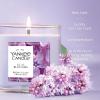 imageYankee Candle Medium Pillar Scented Candle with up to 115 Hour Burn Time Premium Plant Wax Blend for Consistent Burn 1425 oz Pillar Candle with Room Filling Fragrance Midnight JasmineLilac Blossoms