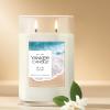 imageYankee Candle Medium Pillar Scented Candle with up to 115 Hour Burn Time Premium Plant Wax Blend for Consistent Burn 1425 oz Pillar Candle with Room Filling Fragrance Midnight JasmineSun  Sand