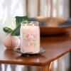 imageYankee Candle Medium Pillar Scented Candle with up to 115 Hour Burn Time Premium Plant Wax Blend for Consistent Burn 1425 oz Pillar Candle with Room Filling Fragrance Midnight JasmineFresh Cut Roses