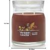 imageYankee Candle Studio Scented Candle with up to 50 Hour Burn Time Premium Plant Wax Blend for Consistent Burn 10 oz Jar Candle with Room Filling Fragrance Red Apple WreathAutumn Wreath
