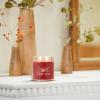 imageYankee Candle Studio Scented Candle with up to 50 Hour Burn Time Premium Plant Wax Blend for Consistent Burn 10 oz Jar Candle with Room Filling Fragrance Red Apple WreathSparkling Cinnamon