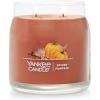 imageYankee Candle Studio Scented Candle with up to 50 Hour Burn Time Premium Plant Wax Blend for Consistent Burn 10 oz Jar Candle with Room Filling Fragrance Red Apple WreathSpiced Pumpkin