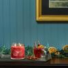 imageYankee Candle Studio Scented Candle with up to 50 Hour Burn Time Premium Plant Wax Blend for Consistent Burn 10 oz Jar Candle with Room Filling Fragrance Red Apple WreathSparkling Cinnamon