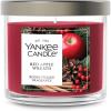 imageYankee Candle Large Tumbler Scented Candle with up to 80 Hour Burn Time Premium Plant Wax Blend for Consistent Burn 20 oz Tumbler Candle with Room Filling Fragrance Sparkling SnowRed Apple Wreath
