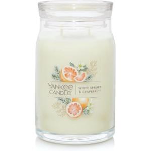 imageYankee Candle Large Tumbler Scented Candle with up to 80 Hour Burn Time Premium Plant Wax Blend for Consistent Burn 20 oz Tumbler Candle with Room Filling Fragrance Midsummers NightWhite Spruce  Grapefruit