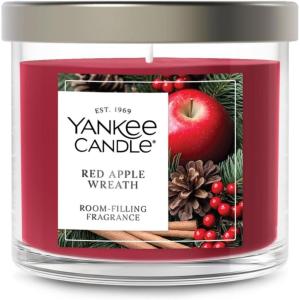imageYankee Candle Large Tumbler Scented Candle with up to 80 Hour Burn Time Premium Plant Wax Blend for Consistent Burn 20 oz Tumbler Candle with Room Filling Fragrance Sparkling SnowRed Apple Wreath