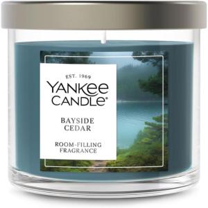 imageYankee Candle Large Tumbler Scented Candle with up to 80 Hour Burn Time Premium Plant Wax Blend for Consistent Burn 20 oz Tumbler Candle with Room Filling Fragrance Midsummers NightBayside Cedar