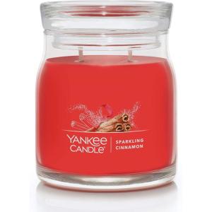 imageYankee Candle Studio Scented Candle with up to 50 Hour Burn Time Premium Plant Wax Blend for Consistent Burn 10 oz Jar Candle with Room Filling Fragrance Red Apple WreathSparkling Cinnamon