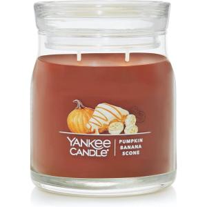 imageYankee Candle Studio Scented Candle with up to 50 Hour Burn Time Premium Plant Wax Blend for Consistent Burn 10 oz Jar Candle with Room Filling Fragrance Red Apple WreathPumpkin Banana Scone
