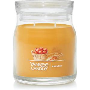 imageYankee Candle Studio Scented Candle with up to 50 Hour Burn Time Premium Plant Wax Blend for Consistent Burn 10 oz Jar Candle with Room Filling Fragrance Red Apple WreathHarvest
