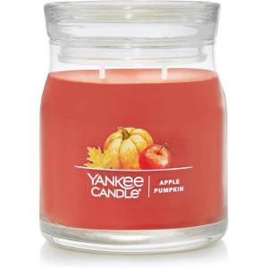 imageYankee Candle Studio Scented Candle with up to 50 Hour Burn Time Premium Plant Wax Blend for Consistent Burn 10 oz Jar Candle with Room Filling Fragrance Red Apple WreathApple Pumpkin