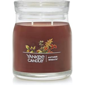 imageYankee Candle Studio Scented Candle with up to 50 Hour Burn Time Premium Plant Wax Blend for Consistent Burn 10 oz Jar Candle with Room Filling Fragrance Red Apple WreathAutumn Wreath